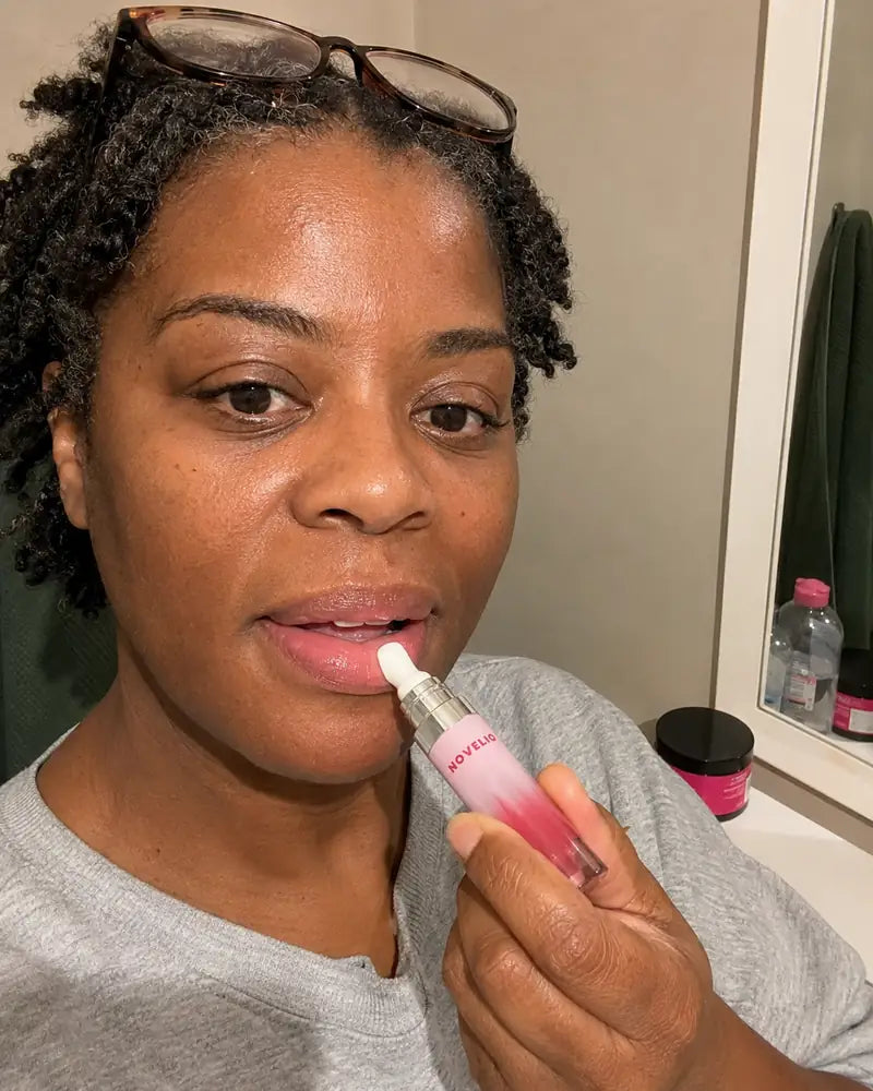 Denise from Chicago applying Forever Pink Lip Essence at night